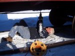 12.16.07 - 13 DEGREES WITH SIX INCHES OF SNOW.  WORK CONTINUES IN SPITE OF THE WEATHER.  KIRK WARNER IS DRILLING PILOT HOLES TO COMPLETE THE INSTALLATION OF THE TIMBER BOLTS SECURING THE DECKING TO THE CENTERSILL ON THE B END OF THE CAR.