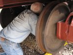 05.25.08 - ATHE LUBE DISC IS BEING INSTALLED IN THE CENTER PLATE BOWL OF THE TRUCK BOLSTER.