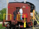 JEFF COLANDINE AND KIRK WARNER RIDE THE CAR INTO STATION TRACK TWO AT THE END OF THE TRIP.  WARREN LLOYD IS THE CONDUCTOR.