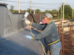 Another shot of Chuck P applying primer - Photo by Chuck Trabert