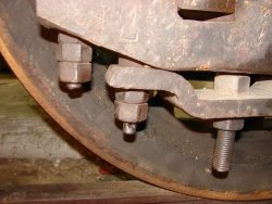 The box binder shown here had to be removed prior to the drop of the fifth axle in order to permit the box to slide freely out of the frame