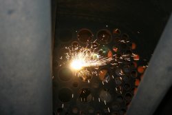 Flame cutting a fire tube end