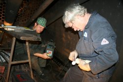 Tom and Collin thickness testing the arch tubes