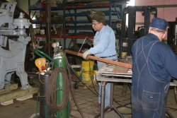 Dennis sets up to make the measuring bar