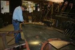 Rick prepares sheet metal for fitting