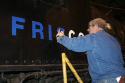 Jim masks the lettering