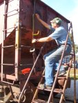 10.12.08 - BOB KUTELLA IS LAYING OUT THE POINTS TO DRILL FOR THE HANDHOLD ATTACHMENTS ON THE VERTICAL SUPPORT.