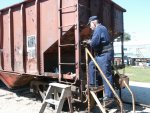 HEROLD WIND IS GRINDING OFF THE RIVETS SO THAT THE HANDHOLDS CAN BE REMOVED PRIOR TO THE NEW SUPPORT INSTALLATION.