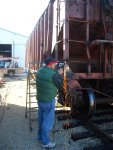 10.07.09 - BRUCE PLAXTON IS GRINDING WELDS WHERE NEW PIECES OF STEEL WERE APPLIED TO CORRECT DAMAGE ON THE CAR.