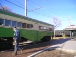 Long time car dept volunteer Jeff Brady walks past Illinois Terminal 101 at Depot St. after leaving track 42 west as another long time member Norm Krentel motors the car. March 19, 2006