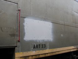 Patch in place on repair of Exhibit Car exterior