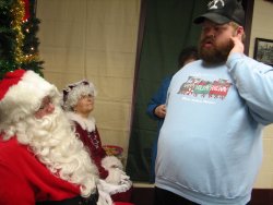 David Stepek with Santa and Mrs. Claus