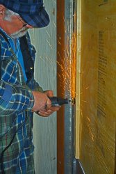 Mike Baksic working on the door