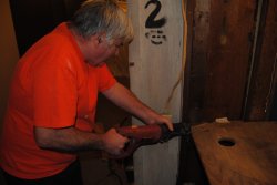 Mark removing the remainder of the cabinet