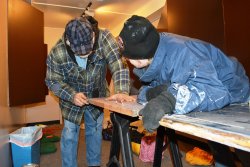 Mike Baksic and Shelly Vanderschaegen planing the door edge for the 2nd Exhibit Car