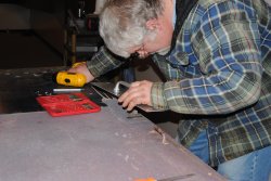 Mike lining up the door handle faceplate