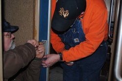 Mike and Ray adjusting a door latch in the Loch Sloy