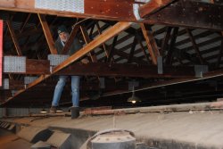 Buzz on the Ely roof checking his pilot holes