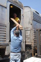 Michael Baksic and Mark Gellman building a platform to hold one of the air conditioners - Photo by Shelly Vanderschaegen