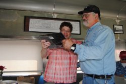 Michael Baksic presents a plaque to Susan Stepek - Photo courtesy of Shelly Vanderschaegen