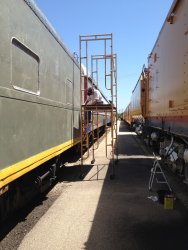 Kevin Kriebs removing adhesive on the 1st Exhibit Car - Photo by Michael McCraren