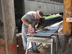 The straight edge is turned to make the vertical cut - Photo by Pauline Trabert 