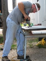 Drilling holes that didn't line up properly - Photo by Pauline Trabert