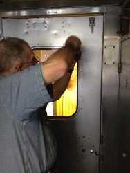 Ray secures the glass in place - Photo by Michael McCraren