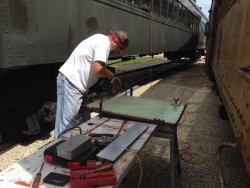 Chuck Trabert cutting off the lower panel area - Photo by Warren Newhauser