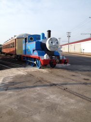 Thomas the Tank Engine leads the Henrietta and other passenger cars - Photo by Michael McCraren