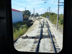 The Denver Zephyr is about to take the switch into the station, note Mike Blackwell in the distance ready to realign the switches once we get through shop - Photo by Kevin Brown using Brian LaKemper's camera