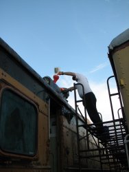 Brian LaKemper pouring antifreeze into the Dyno hot-water heating system - Photo by Pauline Trabert