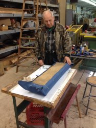 John McKelvey pinned new material to a previously stripped Santa Fe Lounge Car seat - Photo by Michael McCraren