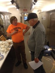 Mark and Jim Windmeier discuss ideas for the china display - Photo by Michael McCraren