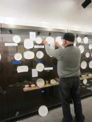 Jim Windmeier arranging the paper plate china - Photo by Patrice Connelly