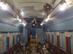 Brian LaKemper wire-wheeling a ceiling panel that was needle-chipped late last fall - Photo courtesy of Brian LaKemper