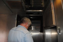 Michael Baksic working on a wiring project inside the Birmingham - Photo by Shelly Vanderschaegen