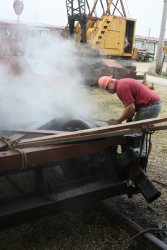 Paul hard at work cleaning tne truck