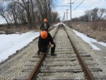 Andy inspecting joint while Frank takes gage measurement