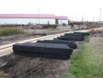 Switch timbers stacked near the connector track.