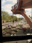 Frank guides the diamond into the air and onto the flatcar