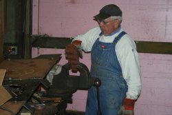 Ed works on the sander manifold