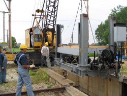 Positioning the mechanisim over the pit for the install. (Stuart B. Brosh photo)