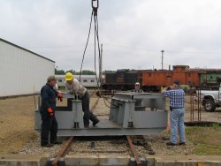 Rigging the table for lifting. (Stuart B. Brosh photo)