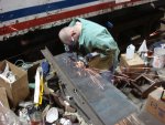 Dan cutting out pieces of steel, soon to be stack covers for METX 308