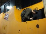 Adam inspecting batteries on Milw. 760 Adam inspecting batteries on Milw. 760