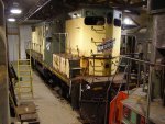 CNW 4160 an EMD GP-7 sits inside the shop.