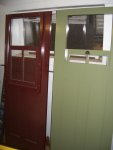 THE DOORS ARE FINISHED AND GLAZED.  THE PHOTO SHOWS THE EXTERIOR COLOR ON THE LEFT AND THE INTERIOR ON THE RIGHT.