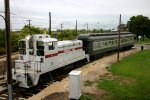 The station switcher wyes a car to be placed on the next "20th Century Limited"