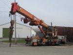 Swinging the burro crane into position to make the first lift